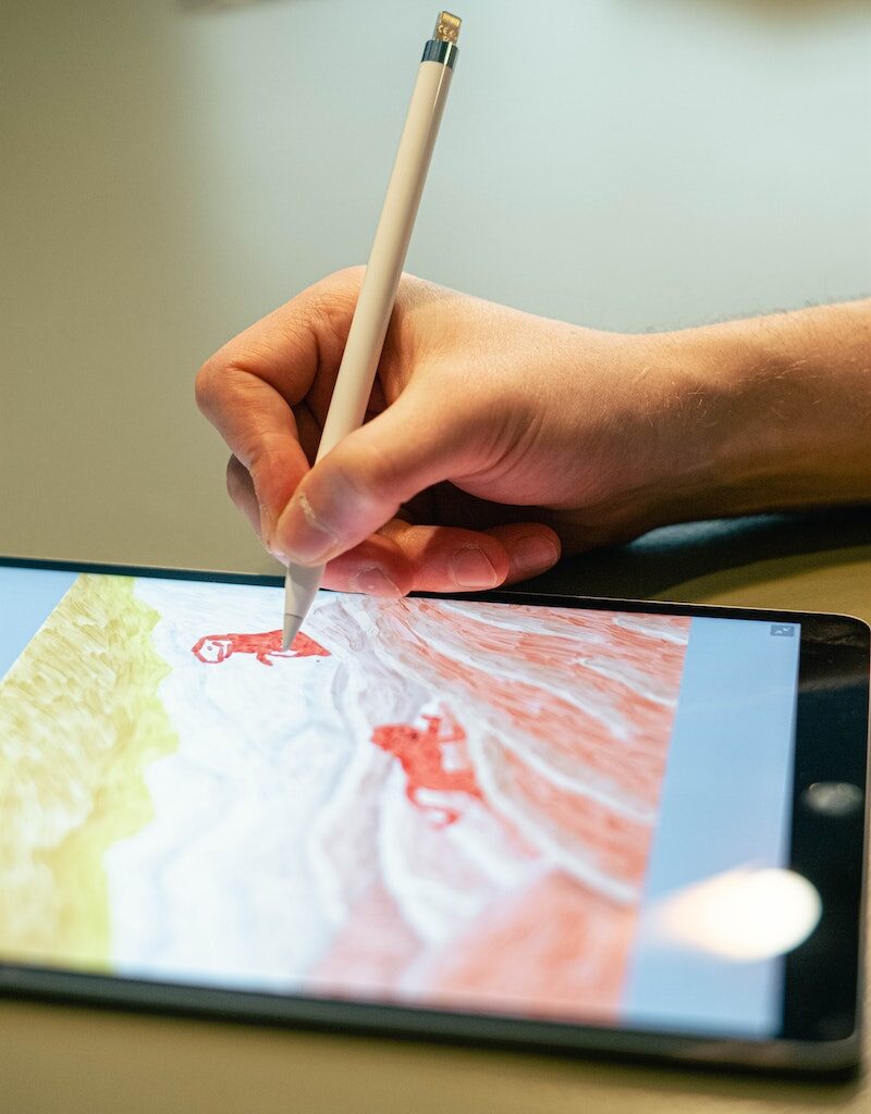 Person Sketching on a Tablet